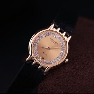 90s Raymond Weil Fidelio Women’s Dress Watch
18k Gold Electroplated